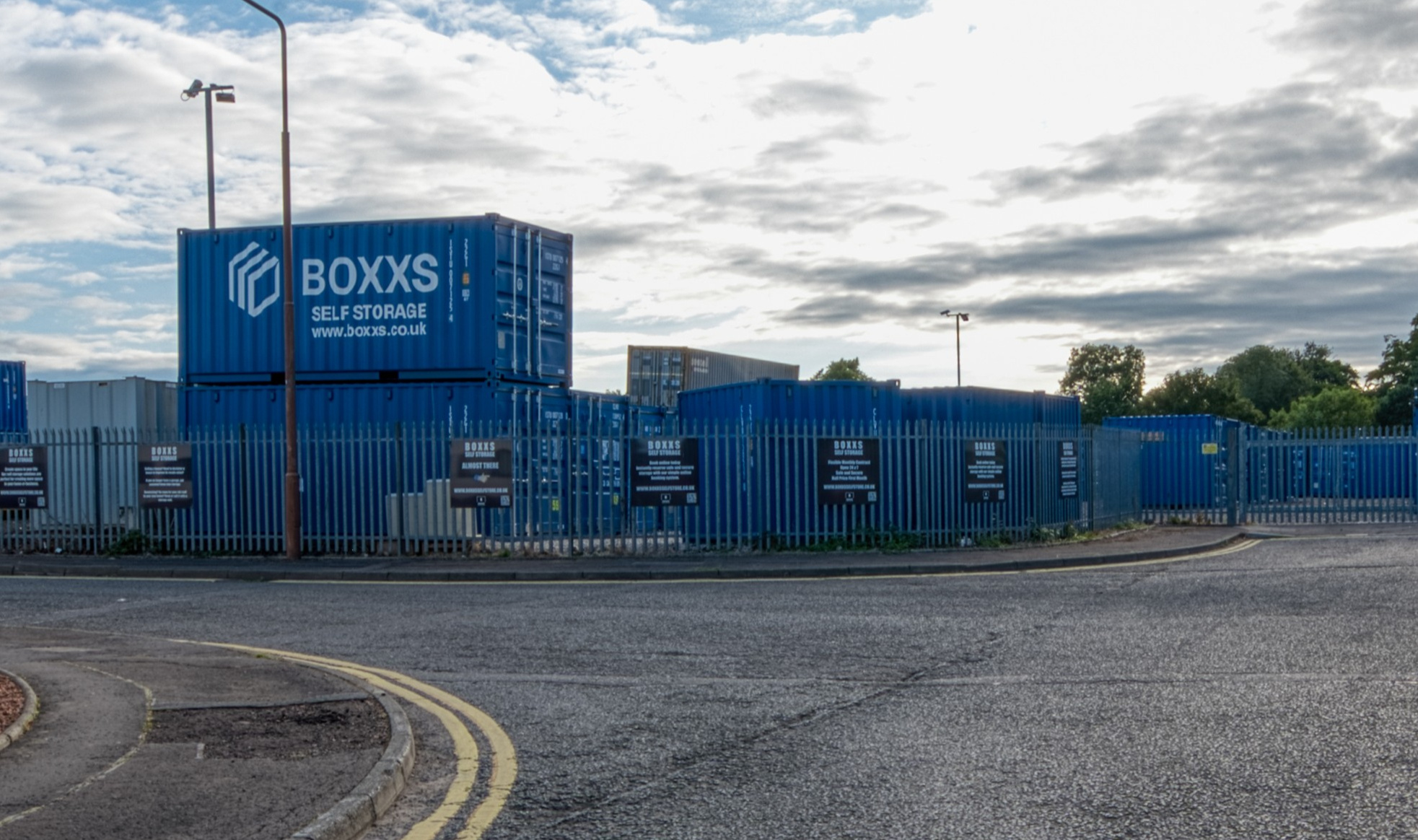 Boxxs self storage entrance with branded container at Linlithgow Alternate angle of Boxxs self storage container with painted logo at the Linlithgow entrance, highlighting secure access for Bo’ness and West Lothian customers